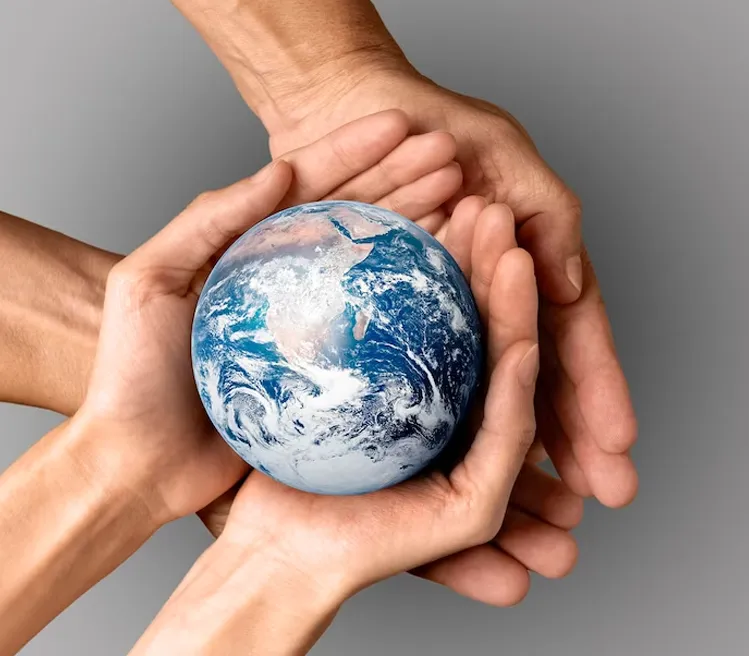 Hands holding a globe, representing the global recognition and transferability of New Zealand qualifications